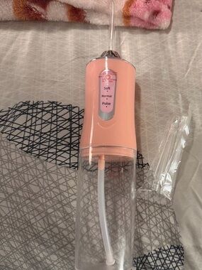 Portable Pink Oral Irrigator Water Flosser